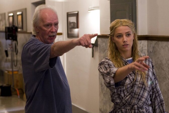 John Carpenter och Amber Heard under inspelningen av "The Ward"