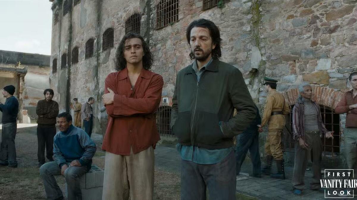 Large 2394c979f4b1b1bdaac50d4512724b28 diego luna and tonatiuh standing together in a prison yard in kiss of the spider woman 1