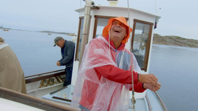 Kotten på bästa fiskarhumör
